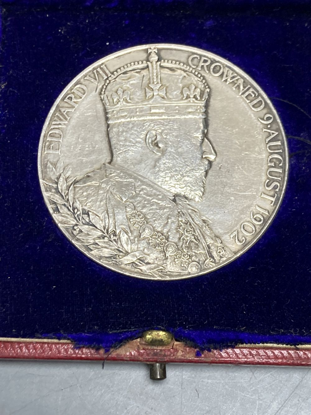 An Edward VII coronation medallion by George William DeSaulle, 55mm, 86g, uncased, GVF
